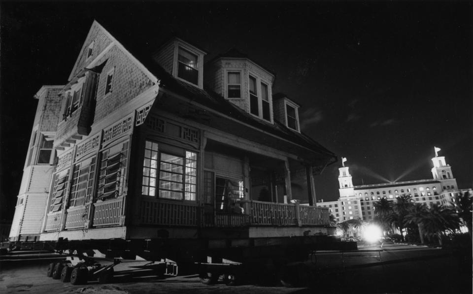 History passes history as the 1886 Sea Gull Cottage is moved in 1984 from its longtime beachfront home at The Breakers property to its present site near Royal Poinciana Chapel.