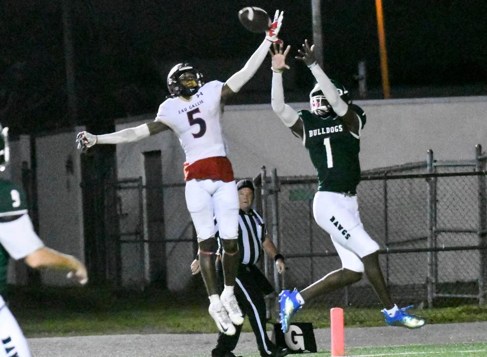 Robert Stafford of Eau Gallie breaks up a pass intended for Devin Alves of Melbourne on Nov. 4, 2021.
