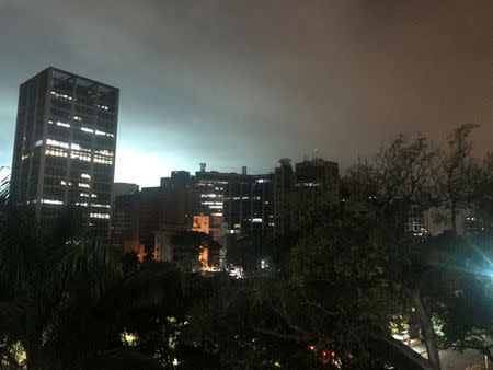 The sky is illuminated during the night in Caracas, Venezuela March 11, 2019. REUTERS/Carlos Jasso