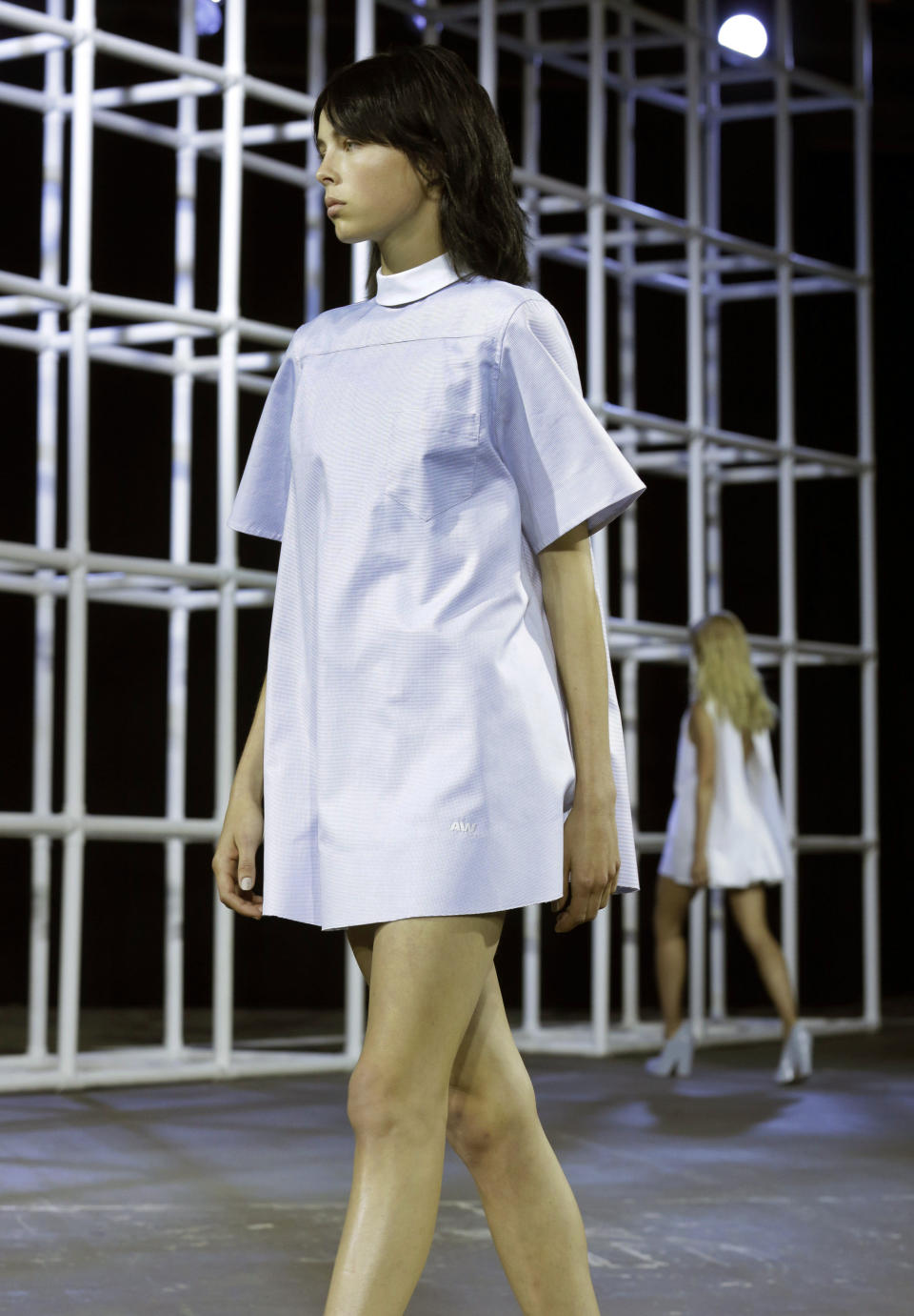 The Alexander Wang Spring 2014 collection is modeled during Fashion Week in New York, Saturday, Sept. 7, 2013. (AP Photo/Richard Drew)