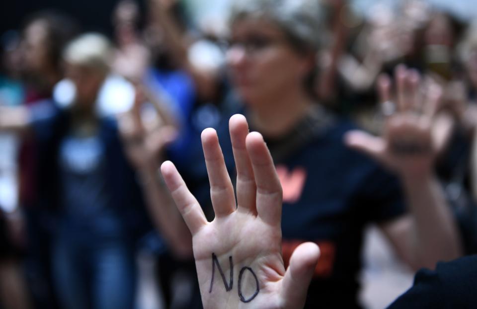 Protesters speak out as Kavanaugh hearing begins