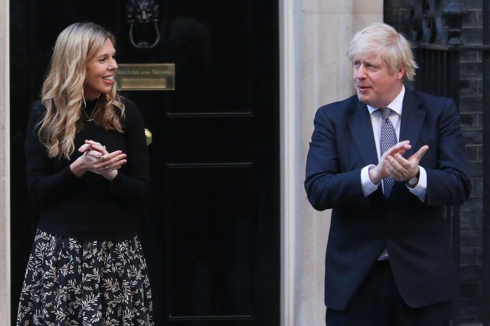 Matt thought the prime minister's experience with COVID would lead to greater appreciation for the NHS. Here Boris Johnson takes part in Clap for Carers with fiancée Carrie Symonds in 2020. (AFP via Getty Images)