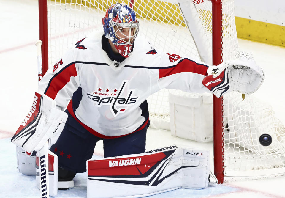 FILE - Washington Capitals goaltender Darcy Kuemper (35) makes a save during the third period of an NHL hockey game against the Buffalo Sabres, April 2, 2024, in Buffalo, N.Y. The Los Angeles Kings acquired Kuemper from the Capitals for forward Pierre-Luc Dubois in a trade of high-priced, underachieving players. (AP Photo/Jeffrey T. Barnes, file)