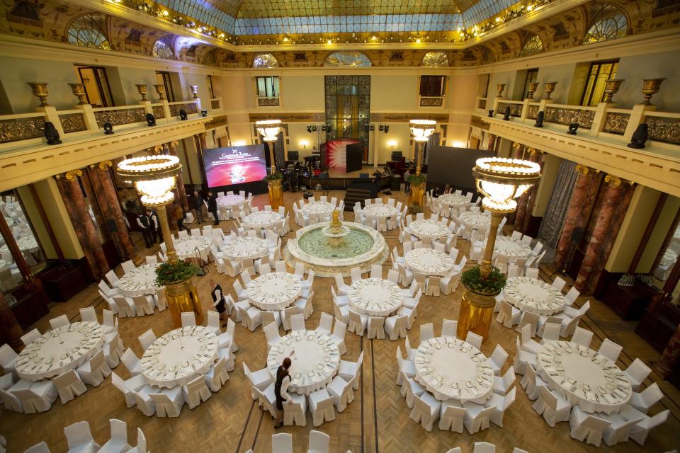 This photo taken on Thursday, Feb. 21, 2019 shows a view of the restaurant inside Moscow's iconic Metropol Hotel in Moscow, Russia. The Metropol, across the street from the Bolshoi Theater and 500 meters from Red Square, became a favorite with world leaders and celebrities. In 2009, U.S. President Barak Obama also gave a speech at the hotel. (AP Photo/Alexander Zemlianichenko)