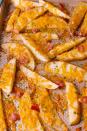 <p>Because you can't go wrong with bacon, ranch and cheddar.</p><p>Get the recipe from <a href="https://www.delish.com/cooking/recipes/a49567/ranch-potato-wedges-recipe/" rel="nofollow noopener" target="_blank" data-ylk="slk:Delish;elm:context_link;itc:0;sec:content-canvas" class="link ">Delish</a>.</p>