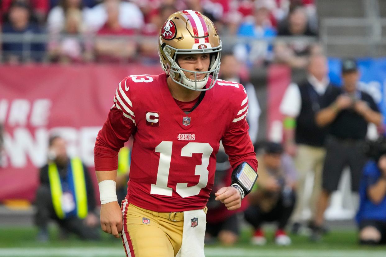 San Francisco 49ers quarterback Brock Purdy (13) lines up against the Arizona Cardinals during the first half of an NFL football game, Sunday, Dec. 17, 2023, in Glendale, Ariz. (AP Photo/Rick Scuteri)