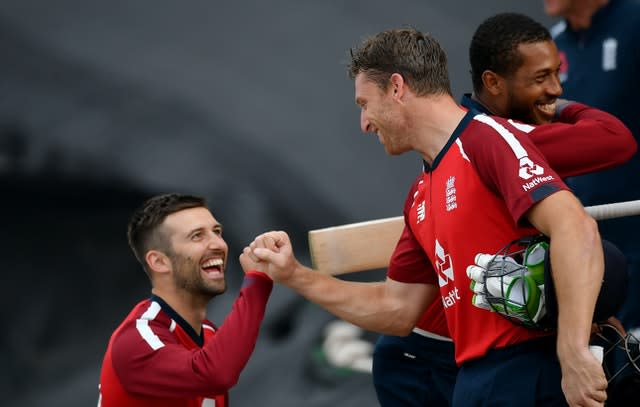 Jos Buttler (right) saw England home