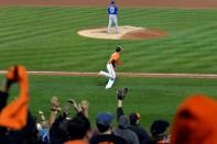 Sep 30, 2015; Baltimore, MD, USA; Baltimore Orioles third baseman Manny Machado (13) rounds the bases after hitting a a solo home run off Toronto Blue Jays relief pitcher Ryan Tepera (52) during the seventh inning at Oriole Park at Camden Yards. Tommy Gilligan-USA TODAY Sports