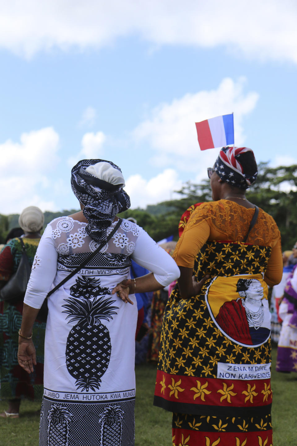 Supporters of the so-called Wuambushu operation that aims at expelling migrants, destroying slums and eradicating violence gather at a soccer stadium in Chirongui, in the French Indian Ocean territory of Mayotte, Thursday, April 27, 2023. France is facing a migration quagmire on the island territory of Mayotte off Africa’s east coast. The government sent in 2,000 troops and police to carry out mass expulsions, destroy slums and eradicate violent gangs. But the operation has become bogged down and raised concerns of abuse, aggravating tensions between local residents and immigrants from the neighboring country of Comoros. (AP Photo/Gregoire Merot)