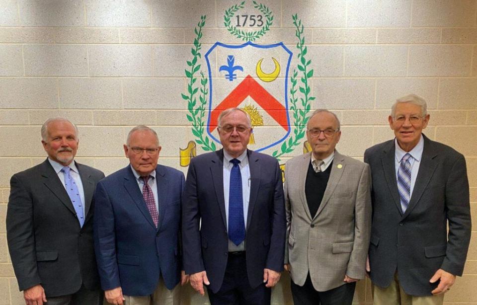 George W.W. George Jones Jr., second from left, is seen with fellow York Township commissioners. The panel denied by a 4-1 vote a proposal to rezone former Red Lion Country Club property to allow for high-density residences.