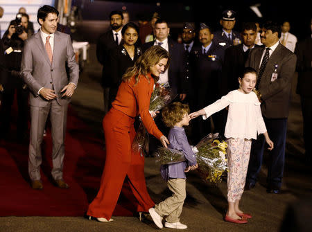 Canadian Prime Minister Justin Trudeau his wife Sophie Gregoire Trudeau and their children daughter Ella Grace (R) and son Hadrien walk towards their car upon their arrival at Air Force Station Palam in New Delhi, India, February 17, 2018. REUTERS/Adnan Abidi