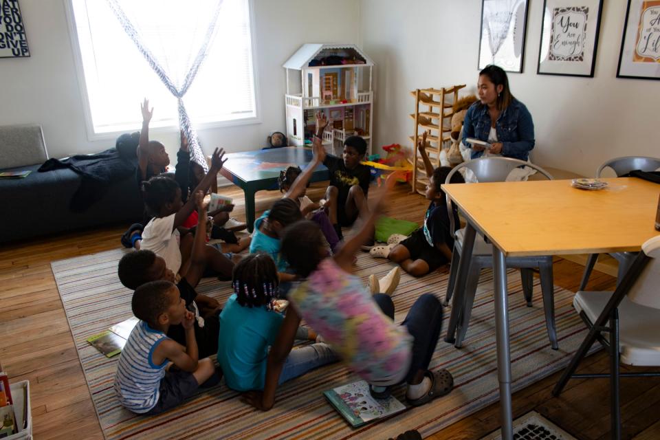 Inside of Brilliant Detroit's Littlefield hub in Detroit, children volunteer to read aloud during story time on Thursday, July 27, 2023.