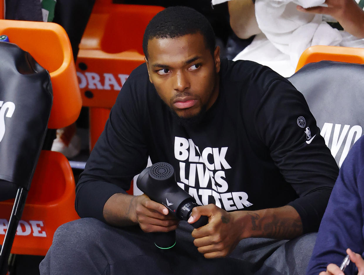 LAKE BUENA VISTA, FLORIDA - AUGUST 29: Sterling Brown #23 of the Milwaukee Bucks holds the Hyperice Hypervolt during the first quarter in Game Five of the Eastern Conference First Round against the Orlando Magic during the 2020 NBA Playoffs at AdventHealth Arena at ESPN Wide World Of Sports Complex on August 29, 2020 in Lake Buena Vista, Florida. NOTE TO USER: User expressly acknowledges and agrees that, by downloading and or using this photograph, User is consenting to the terms and conditions of the Getty Images License Agreement.  (Photo by Kevin C. Cox/Getty Images)