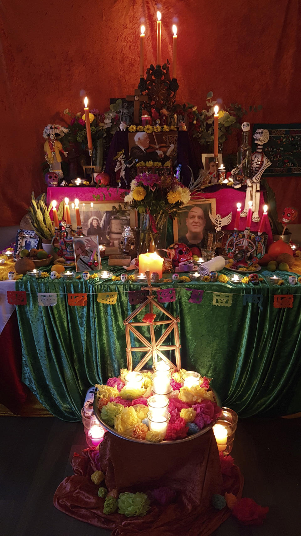 This Nov. 16, 2019 photo shows an altar made by mortician and death cafe host Angela Craig-Fournes in honor of Death Cafe founder Jon Underwood, who died in 2017. (Angela Craig-Fournes via AP)