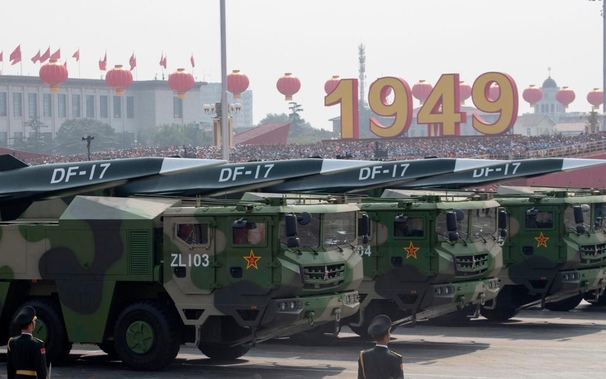 China is believed to be pursuing a rapid expansion of its nuclear arsenal - AP Photo/Ng Han Guan