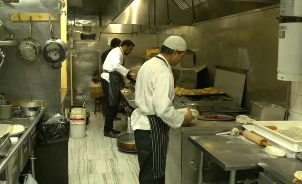 The kitchen of the Sakina Halal Grill in Washington, D.C., is seen in February 2019. / Credit: CBS News