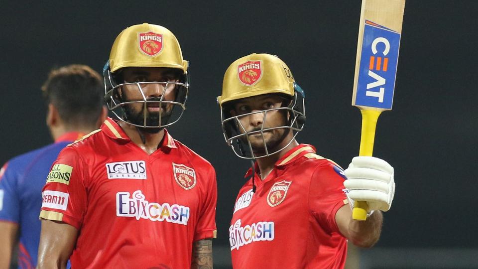 Mayank Agarwal raises his bat to celebrate his first half century of IPL 2021.