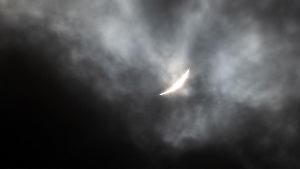 <div>NIAGARA FALLS, NEW YORK - APRIL 8: The 'Diamond Ring' is visible during the Total Solar Eclipse seen through clouds on April 8, 2024 in Niagara Falls, New York. Millions of people have flocked to areas across North America that are in the "path of totality" in order to experience a total solar eclipse. During the event, the moon will pass in between the sun and the Earth, appearing to block the sun. (Photo by Adam Gray/Getty Images)</div>