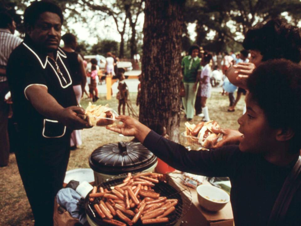 Family at a picnic in Washington Park, South Side, Chicago, Illinois, July, 1973