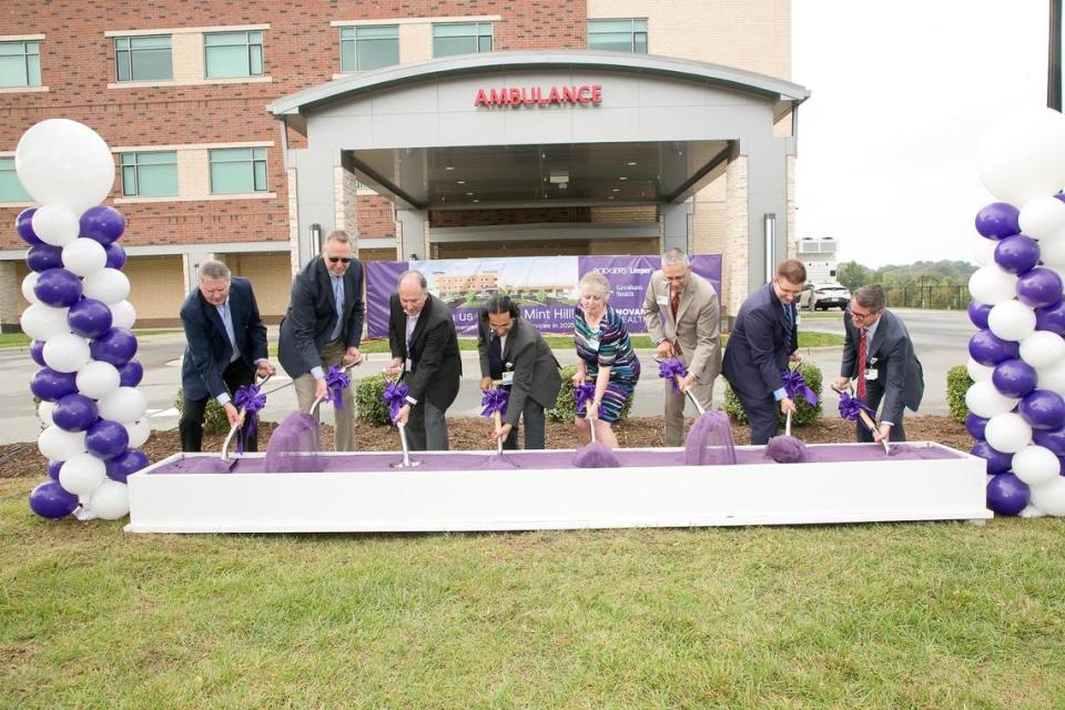 Novant Health officials celebrate a groundbreaking for an emergency department expansion at their Mint Hill facility.