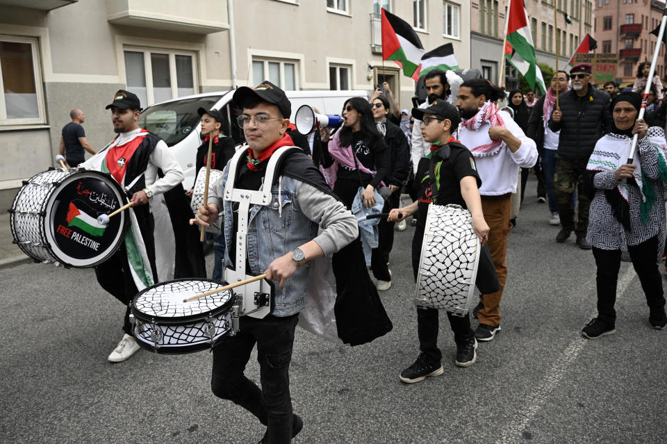 A band performs during a pro-Palestinian demonstration that marches outside the Eurovision Village, a fan zone that will host music performances and live broadcast of the Eurovision Song Contest, in Folkets Park in Malmo, Sweden on May 4, 2024. A week of Eurovision Song Contest festivities kicked off Saturday, on May 4, in the southern Swedish town of Malmo, with 37 countries taking part. The first semi-final takes place on Tuesday, May 7, the second on Thursday, May 9, and the grand final concludes the event on May 11. Thousands of people are expected to attend pro-Palestinian rallies throughout the week in Malmo. (Photo by Johan NILSSON / TT News Agency / AFP) / Sweden OUT (Photo by JOHAN NILSSON/TT News Agency/AFP via Getty Images)