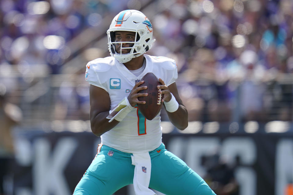 Miami Dolphins quarterback Tua Tagovailoa (1) aims a pass during the first half of an NFL football game against the Baltimore Ravens, Sunday, Sept. 18, 2022, in Baltimore. (AP Photo/Julio Cortez)