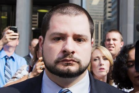 Toronto police officer Constable James Forcillo leaves the court after being let out on bail in Toronto, August 20, 2013. REUTERS/Mark Blinch/File Photo