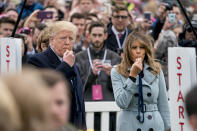 <p>President Donald Trump and first lady Melania Trump blow whistles to start a race at the annual White House Easter Egg Roll on the South Lawn of the White House in Washington, Monday, April 2, 2018. (Photo: Andrew Harnik/AP) </p>