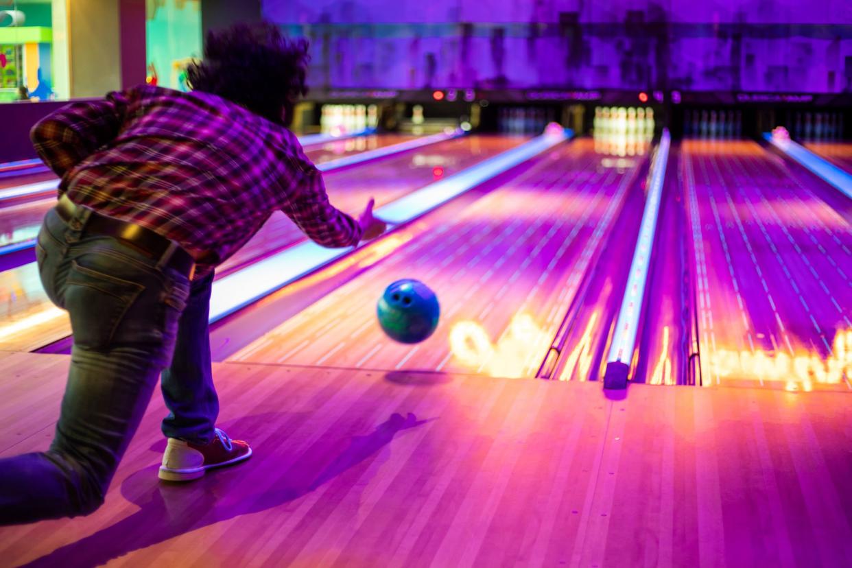 Man playing bowling