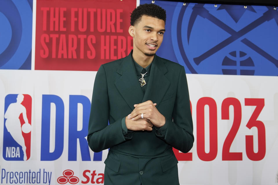 Victor Wembanyama arrives at Barclays Center before the NBA basketball draft, Thursday, June 22, 2023, in New York. (AP Photo/John Minchillo)