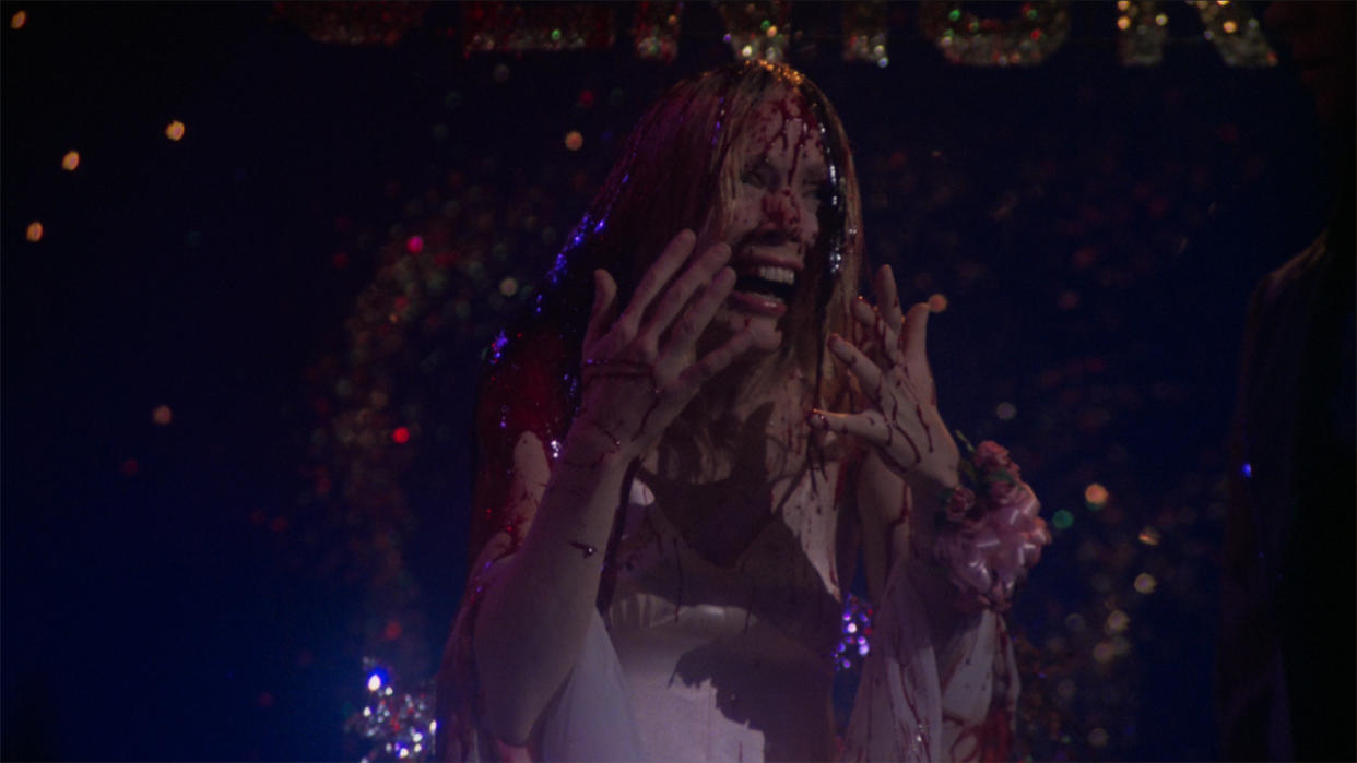  Carrie (Sissy Spacek) covered in blood at the prom. 