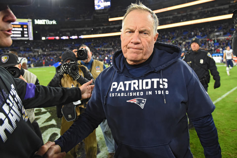 Patriots coach Bill Belichick walks off of the field after losing to the against the Baltimore Ravens. (Getty Images)