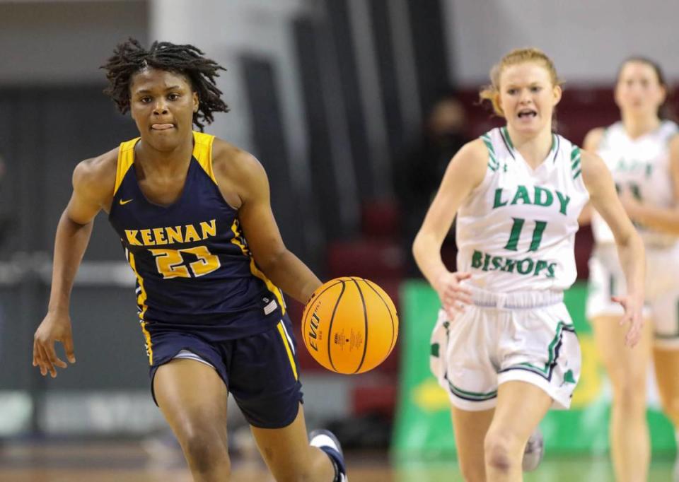 Keenan’s MiLaysia Fulwiley (23) dribbles downcourt as with Bishop England’s Alli Dominiak in pursuit during the 3A state championship game at the USC Aiken Convocation Center on Friday, March 5, 2021.