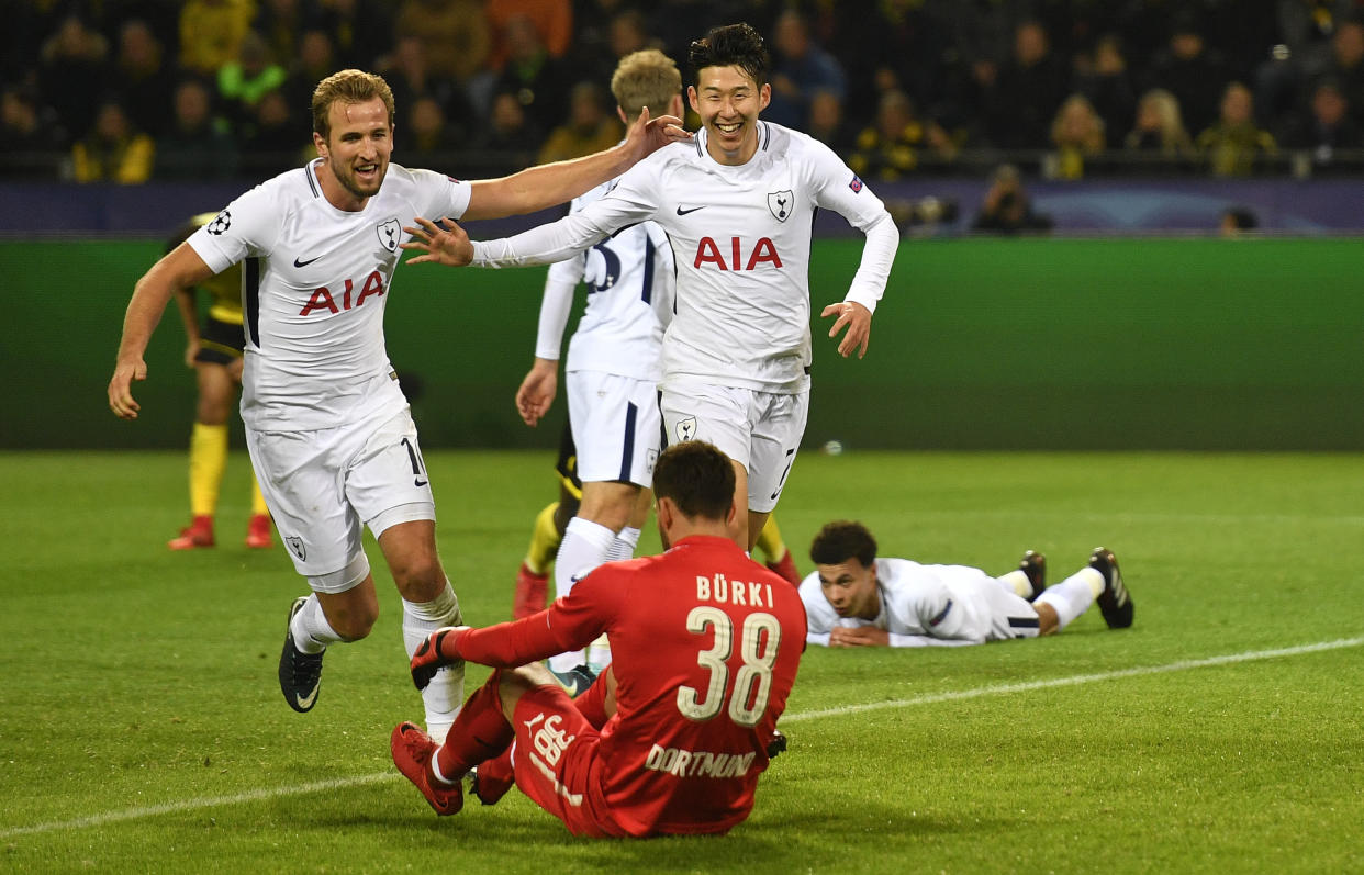 Tottenham’s Son Heung-min, right, celebrates after scoring his side’s second goal