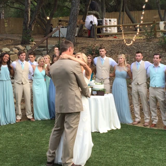 <em>Glee</em> star Heather Morris and her high school sweetheart Taylor Hubbell tied the knot on Saturday in a gorgeous ceremony in Topanga, Calif. In attendance were family, friends, and many of Morris’ <em>Glee</em> castmates! The whole beautiful affair, which was held outdoors at Old Canyon Ranch near Los Angeles, ended up serving as a mini <em>Glee </em>reunion of sorts. Kevin McHale, Jenna Ushkowitz and Vanessa Lengies were on hand to share in the joy. <strong>VIDEO: Celebrity Summer Wedding Watch: Who's Getting Hitched? </strong> Also in attendance was Morris’ on-screen spouse, Naya Rivera. On the Fox musical dramedy Morris played Brittany Pierce, who wed Rivera’s Santana Lopez during the show’s sixth season. Morris looked absolutely stunning in a long, flowing white wedding gown, while Hubbell’s tan, earthy suit was the perfect complement to the outdoor proceedings. The couple said their vows in front of their 1-year-old son Elijah, whom the couple welcomed in September 2013. <strong>VIDEO: The 6 Biggest Celebrity Weddings of 2014! </strong> Lengies, who played Sugar Motta on <em> Glee</em>, snapped a number of great pics, and posted a huge group photo booth shot to Instagram showing Morris and all her friends celebrating the big day. While <em>Glee</em> might have aired its last episode on March 20, it’s clear that the friendships made on set are far from over. Congrats to the happy couple! For more celebrity summer weddings to get excited about, check out the video below.