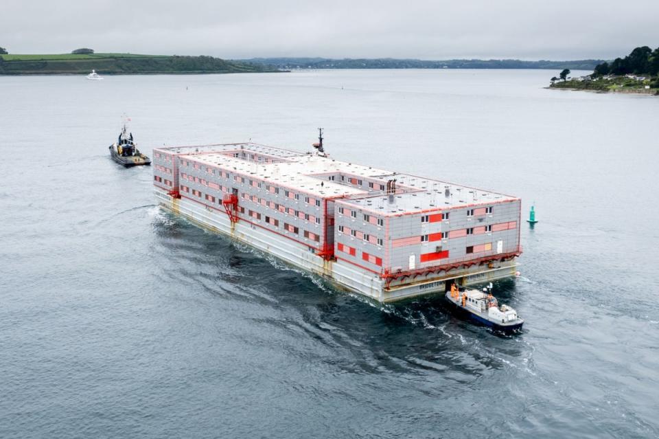 The Bibby Stockholm accommodation barge arrives into Falmouth, Cornwall (PA)