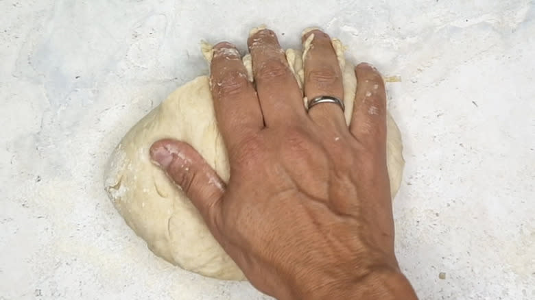 Hand kneading dough