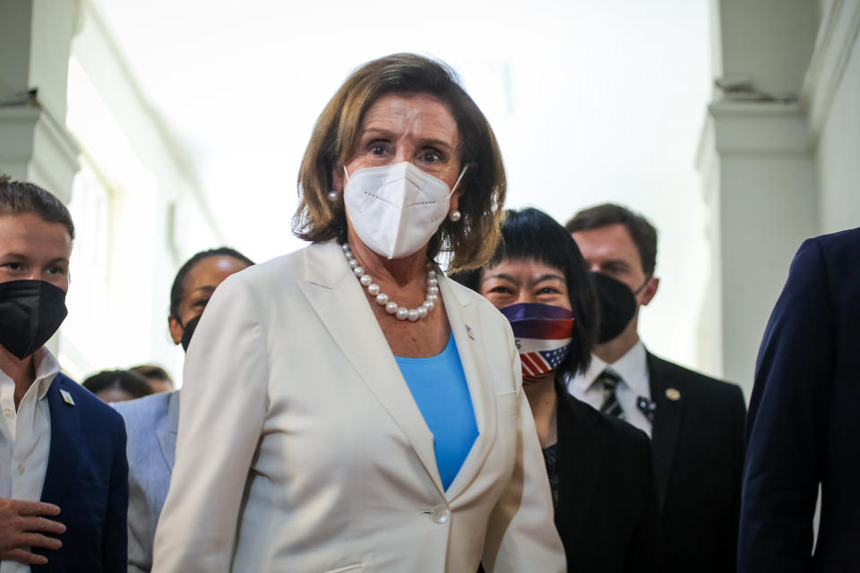 TAIPEI, TAIWAN - AUGUST 03: Speaker of the U.S. House Of Representatives Nancy Pelosi (D-CA), leaves the Legislative Yuan, Taiwan's house of parliament, on August 03, 2022 in Taipei, Taiwan. Pelosi arrived in Taiwan on Tuesday as part of a tour of Asia aimed at reassuring allies in the region, as China made it clear that her visit to Taiwan would be seen in a negative light. (Photo by Annabelle Chih/Getty Images)