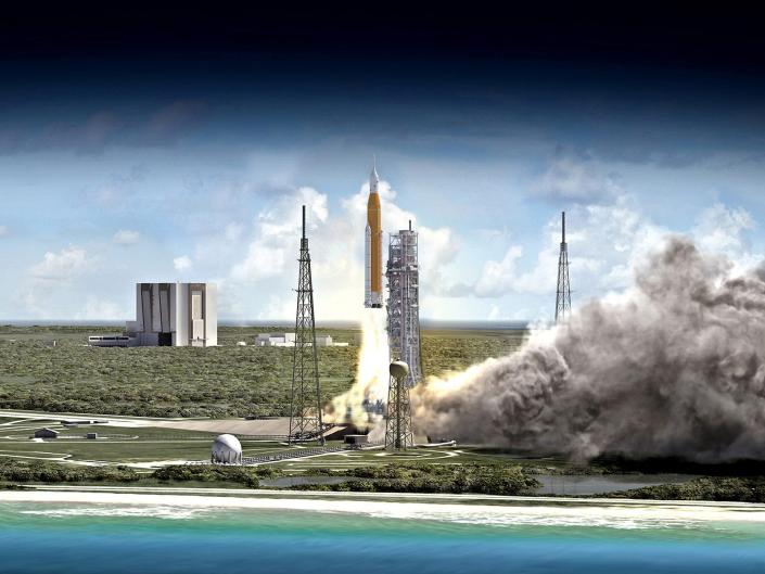 illustration show orange space launch system rocket lifting off