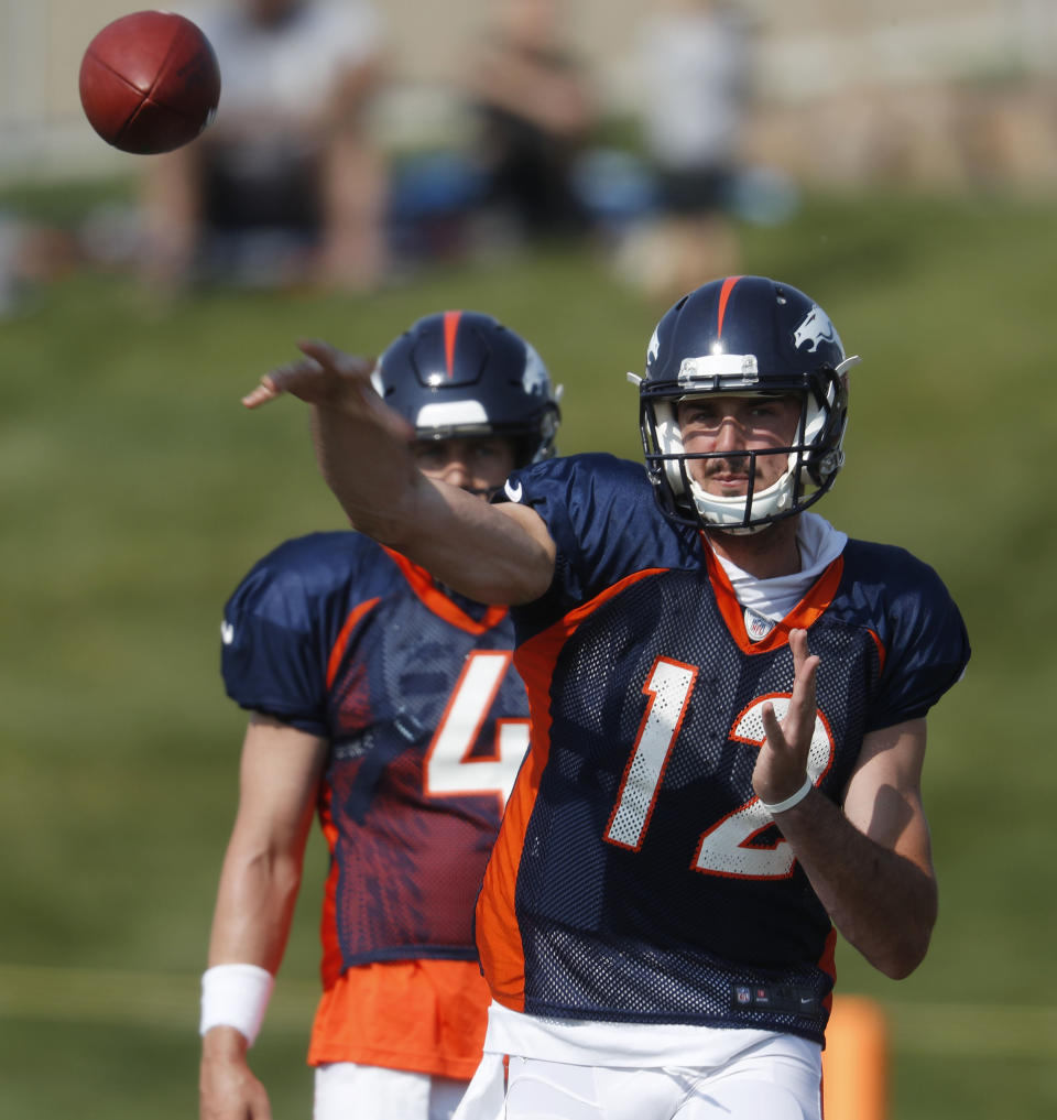 FILE - In this Tuesday, Aug. 7, 2018, file photo, Denver Broncos quarterback Paxton Lynch takes part in drills at NFL football training camp in Englewood, Colo. John Elway cut ties with his biggest draft bust Sunday, Sept. 2, 2018, when he waived quarterback Paxton Lynch less than 24 hours after including him on the Denver Broncos’ 53-man roster. (AP Photo/David Zalubowski, File)