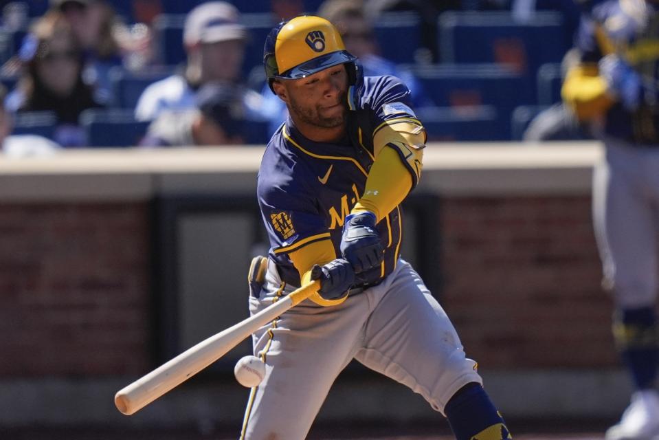 Milwaukee Brewers' Jackson Chourio (11) hits a single during the fifth inning of a baseball game against the New York Mets Friday, March 29, 2024, in New York. (AP Photo/Frank Franklin II)