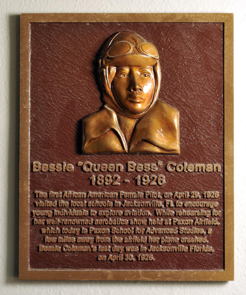 A plaque commemorating Bessie Coleman hangs at Paxon School for Advanced Studies in Jacksonville, near the site of the accident that killed the famous barnstorming pilot in 1926.