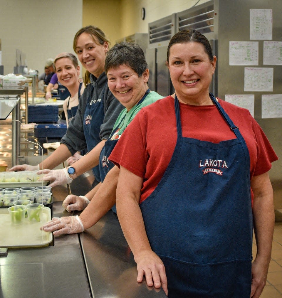 The Lakota cafeteria staff helped Food Service Director Michelle Guzman fulfill her dream of creating a lunchroom that offered greater options and more fresh produce. Shown here are, front to back: Guzman, Kandie Podach, Erin Harmon and Ashlee Allen.