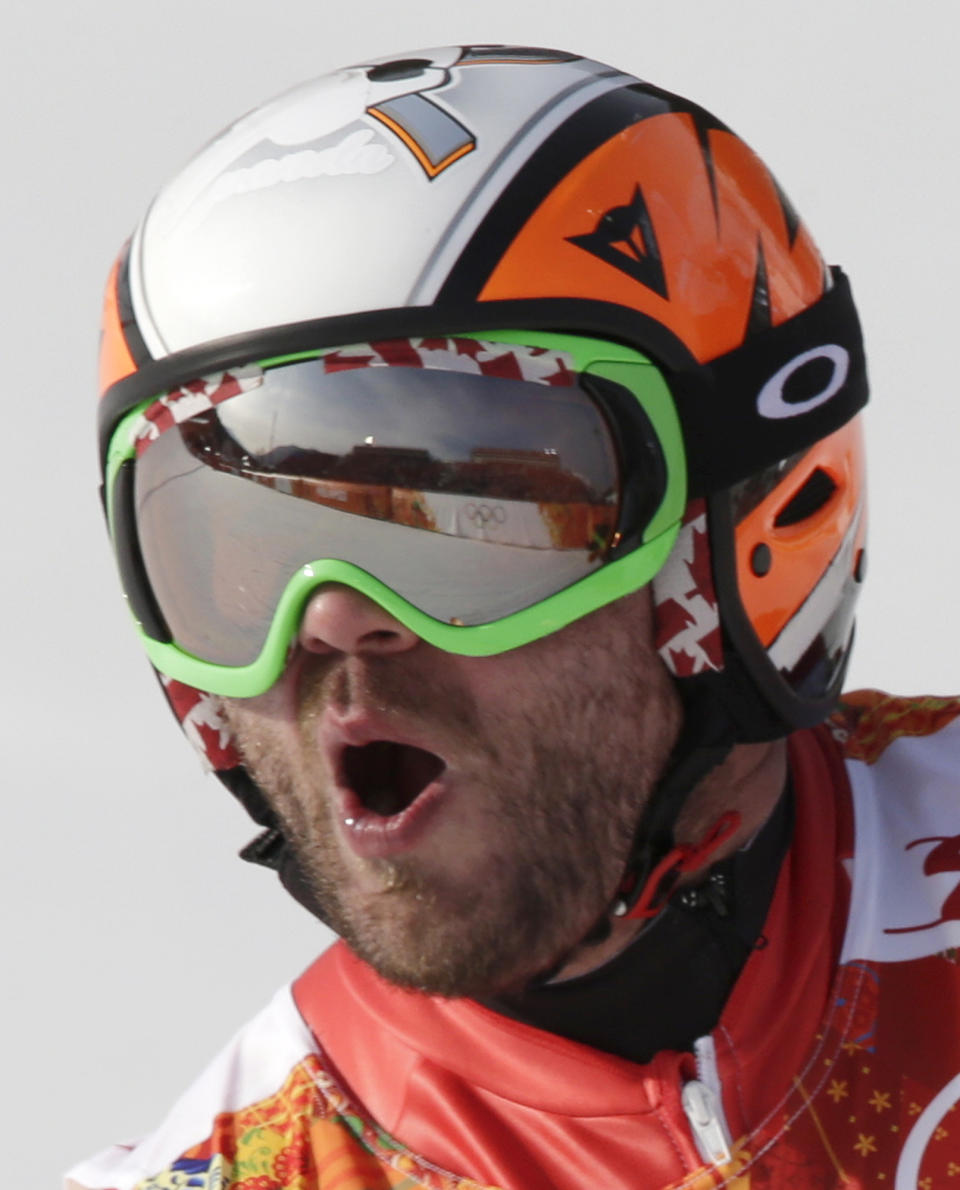 Canada's Jan Hudec celebrates after his run in the men's super-G at the Sochi 2014 Winter Olympics, Sunday, Feb. 16, 2014, in Krasnaya Polyana, Russia.(AP Photo/Gero Breloer)