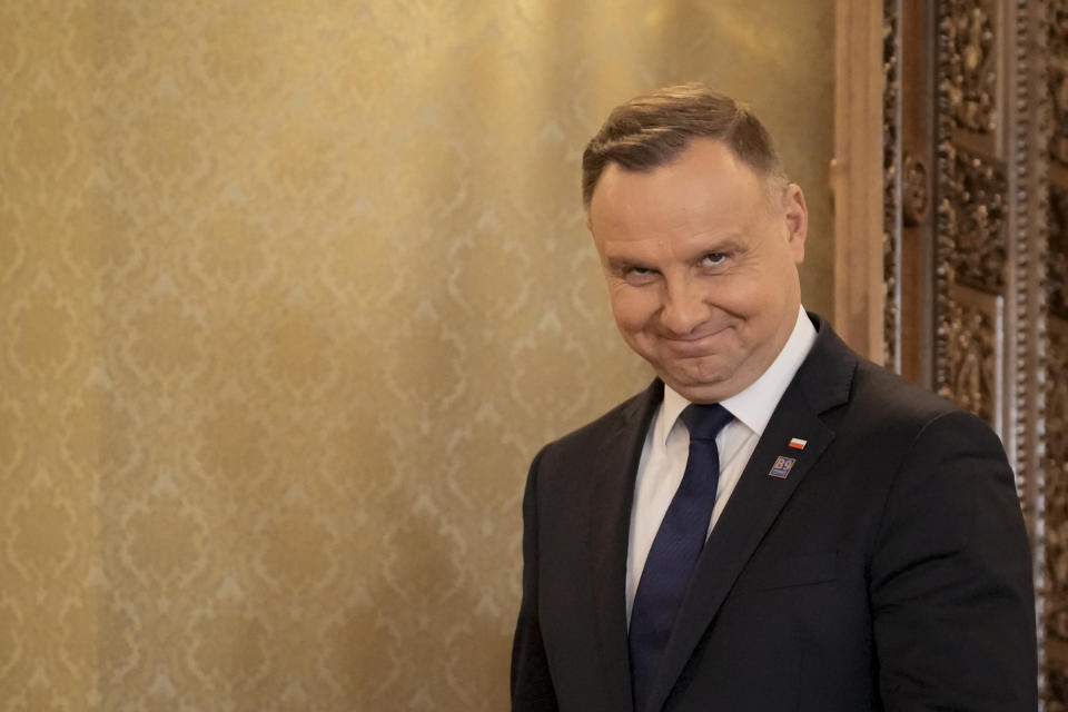 Polish President Andrzej Duda arrives for press statements with Romania's President Klaus Iohannis at the end of the Bucharest Nine (B9) Summit at the Cotroceni Presidential Palace in Bucharest, Romania, Friday, June 10, 2022. (AP Photo/Andreea Alexandru)