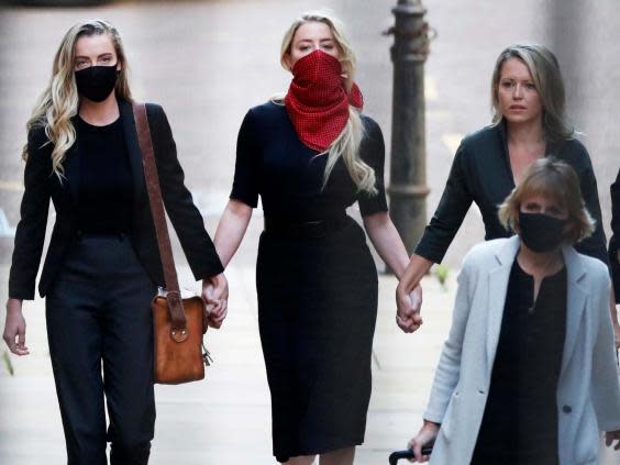 US actress Amber Heard (centre), arrives at the Royal Courts of Justice in London, 7 July 2020. (EPA)