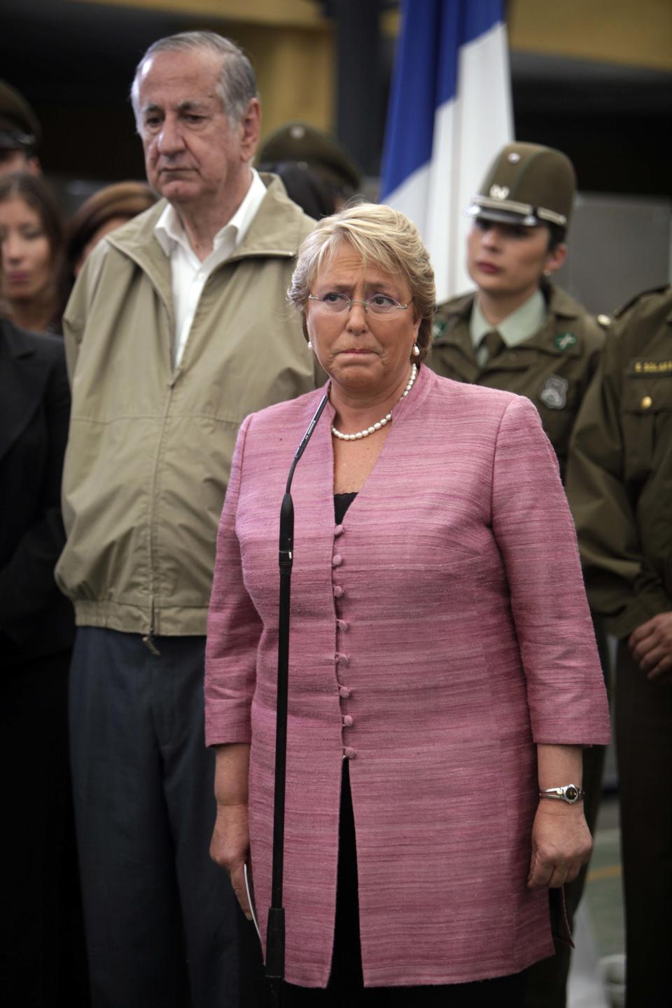 FILE - In this Sunday March 7, 2010 file photo, Chile's President Michelle Bachelet holds a news conference after checking hundreds of items returned by looters or recovered by the police at a police station in Concepcion, Chile. Chile marks the two-year anniversary on Monday Feb. 27, 2012 of the tsunami triggered by a magnitude-8.8 earthquake. (AP Photo/Natacha Pisarenko, File)