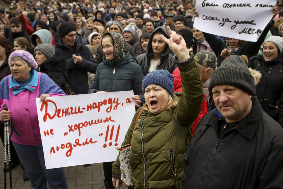 FILE - People chant slogans during a protest initiated by Moldova's recently-formed Movement for the People group and supported by members of Moldova's Russia-friendly Shor Party, against the pro-Western government and low living standards, in Chisinau, Moldova on Feb. 19, 2023. Since Russia fully invaded Ukraine two years ago, a string of incidents in neighboring Moldova's Russia-backed breakaway region of Transnistria have periodically raised the specter that European Union candidate Moldova could also be in Moscow's crosshairs. (AP Photo/Aurel Obreja)