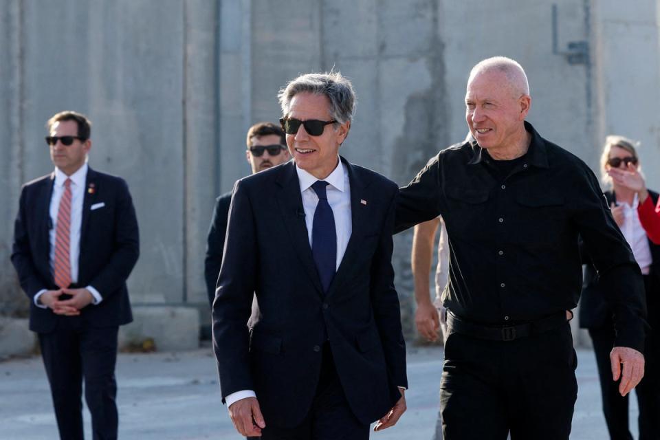 US secretary of state Antony Blinken (C) walks with Israeli defence minister Yoav Gallant (R) at the Kerem Shalom border crossing with the Gaza Strip in southern Israel earlier this month (POOL/AFP/Getty)