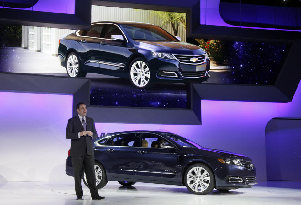 Mark Reuss, president of General Motors North America, presents the 2013 Chevrolet Impala at the New York International Auto Show, in New York's Javits Center, Wednesday, April 4, 2012. General Motors Co.'s Chevrolet brand is trying to resuscitate sales of big sedans with a sleek, new version of the Impala. (AP Photo/Richard Drew)